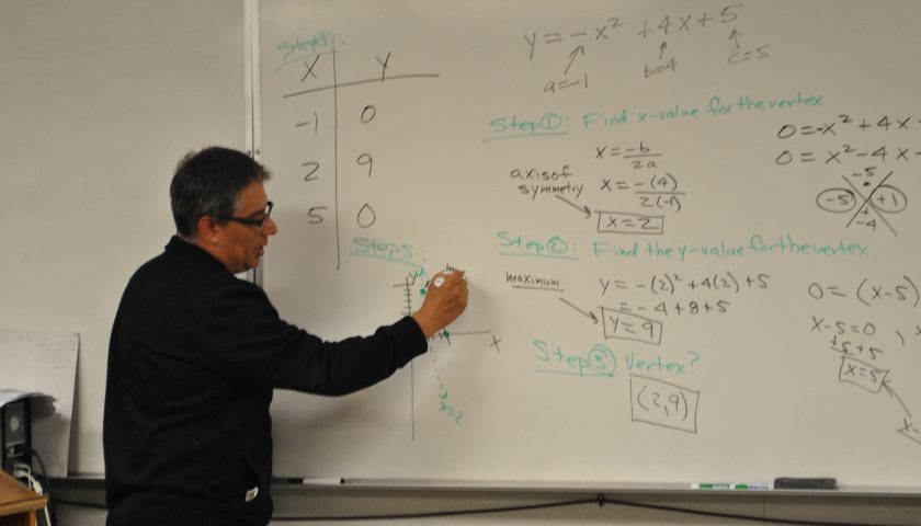 Steps to success— Math teacher Jesse Hernandez guides his students to success in math, just like he led his high school baseball team to the CIF championship in 1984. 