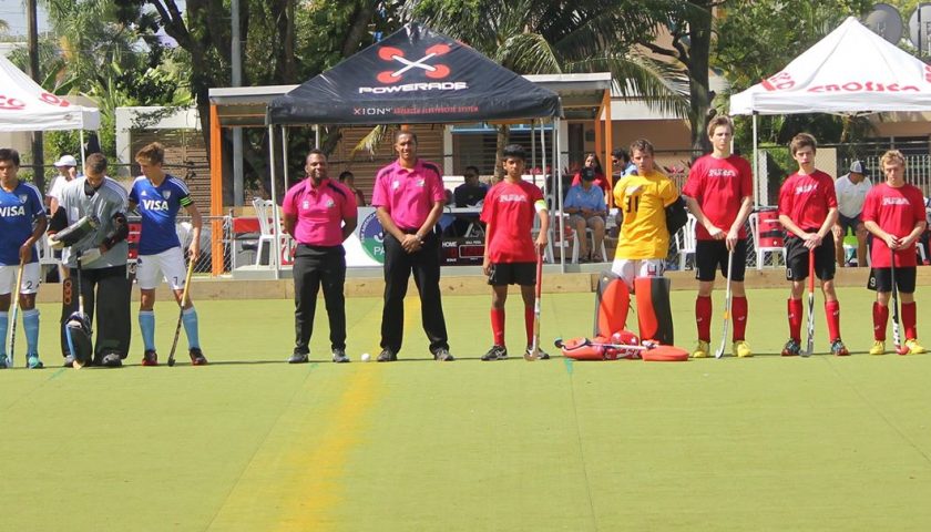 Game on— George (fourth from left) and Jed McGuigan (second from right) with the national team in San Juan, Puerto Rico. On Feb. 5 they played Argentina, but lost by a score of 9–1. Argentina is currently the best field hockey team in the Americas.